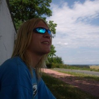 Vidím komín vysoký, jehož pára se dotýká mraků.